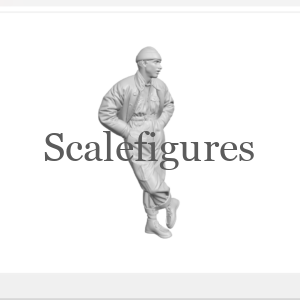 F180 - Man leaning against wall, hands in pockets & legs crossed.