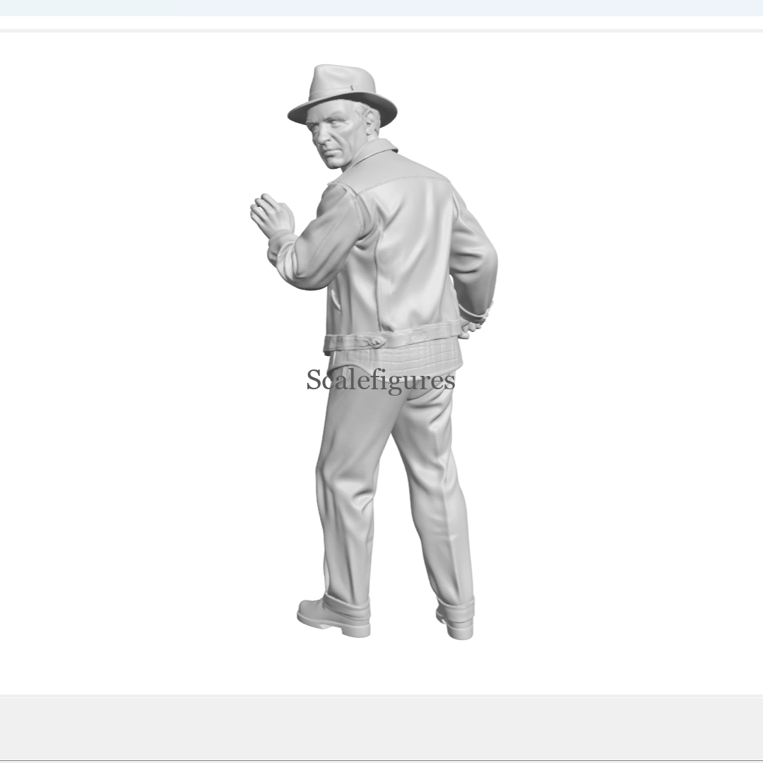 F227 - Man wearing hat, looking back over his shoulder.